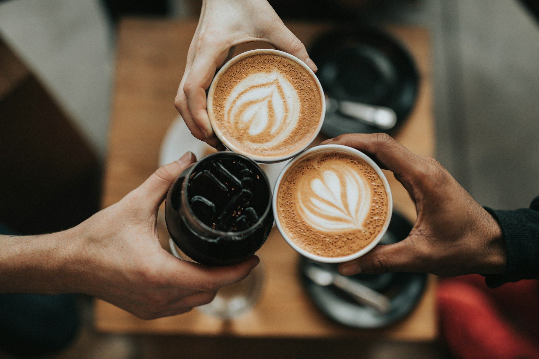 Warm latte cups held together